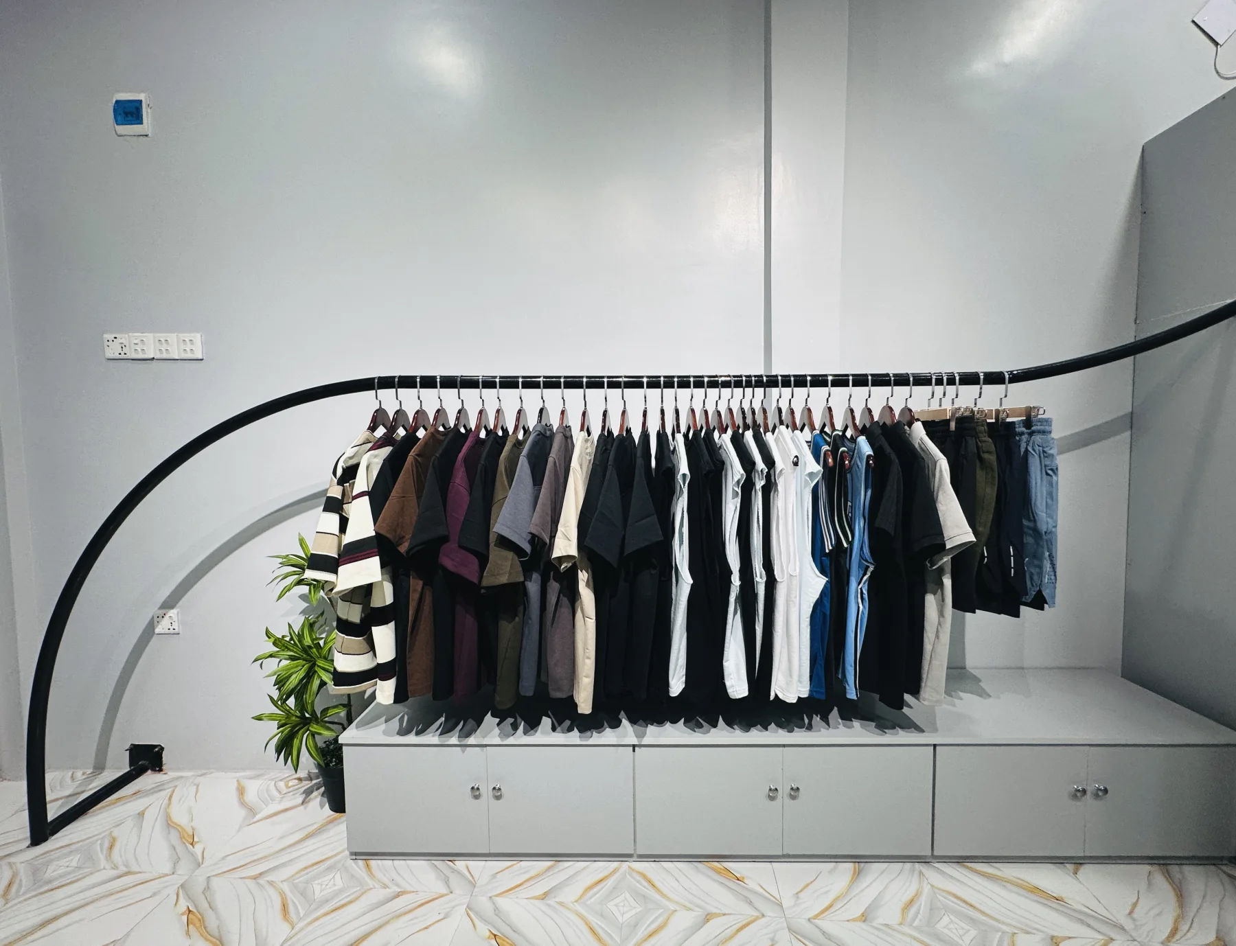 HEIST physical store clothing rack